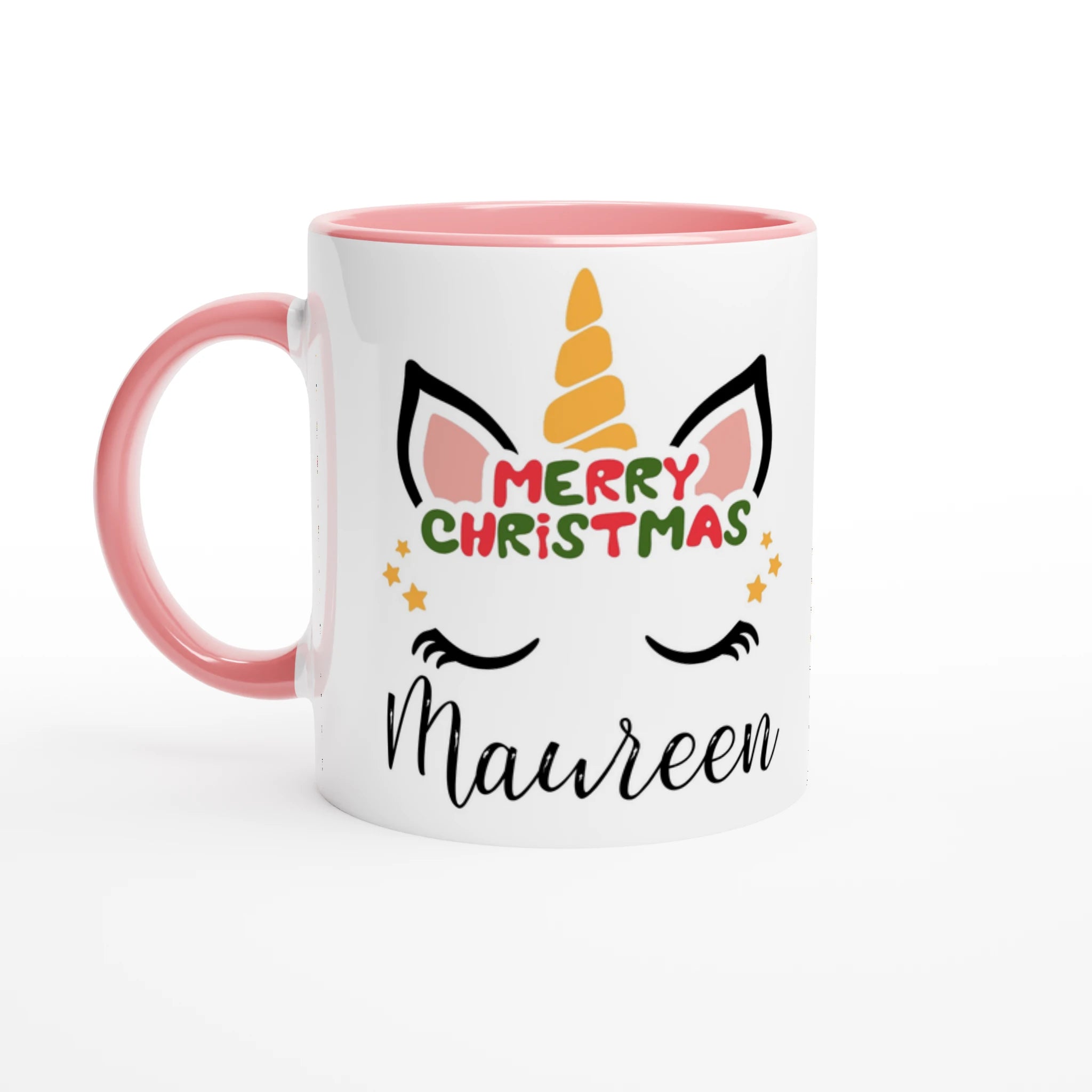 Mug licorne Merry Christmas avec anse rose et intérieur rose, motif licorne festif sur fond blanc.