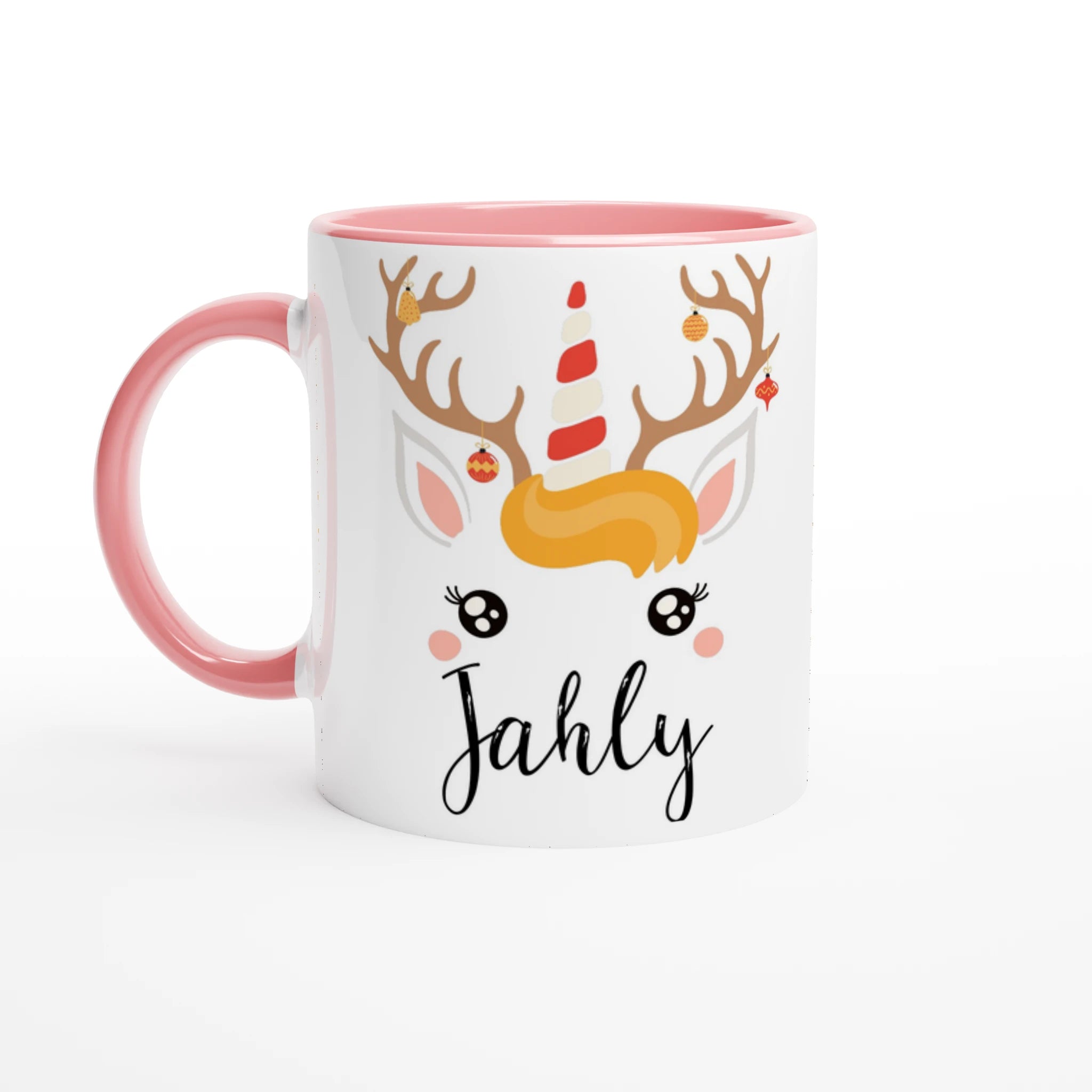 Mug de Noël licorne renne avec bois décorés, corne festive rouge et blanche, anse rose et intérieur rose.