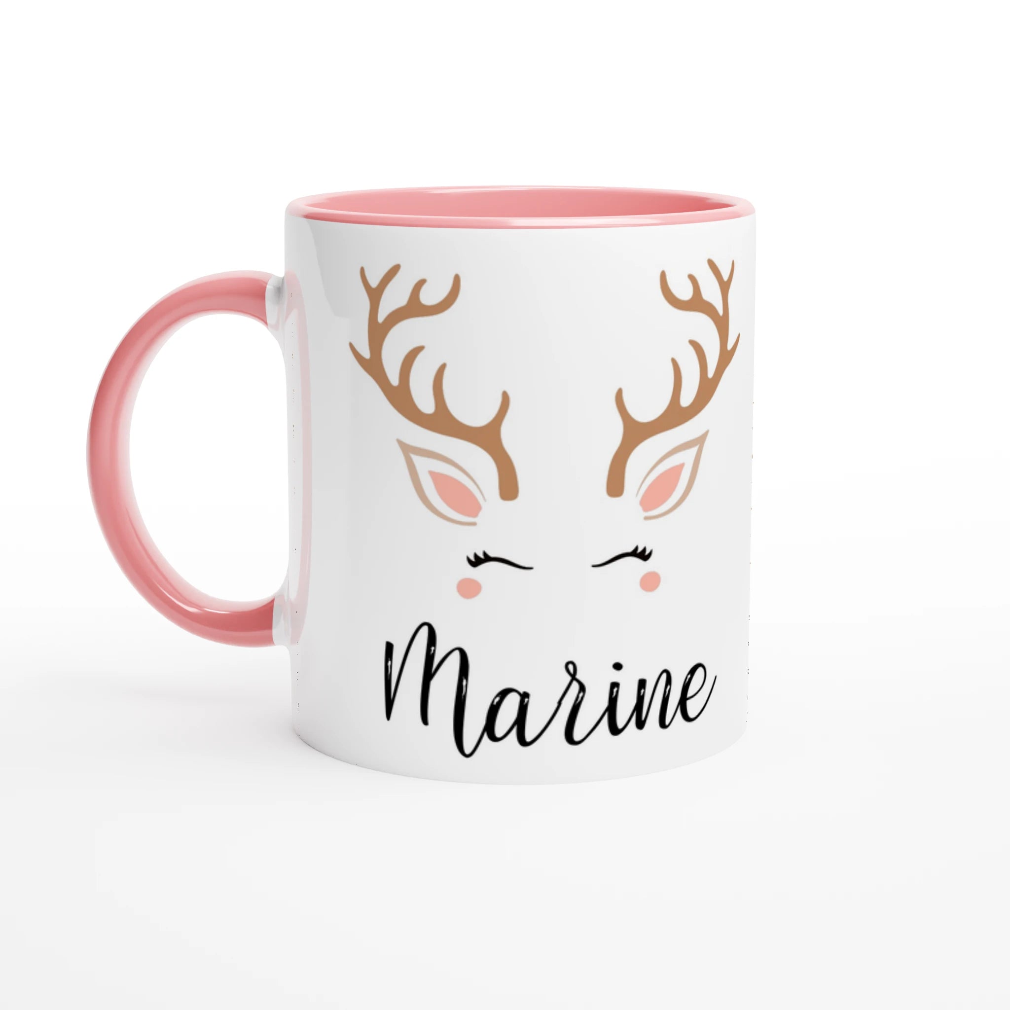 Mug de Noël avec renne graphique au style doux et épuré, anse rose et intérieur rose.