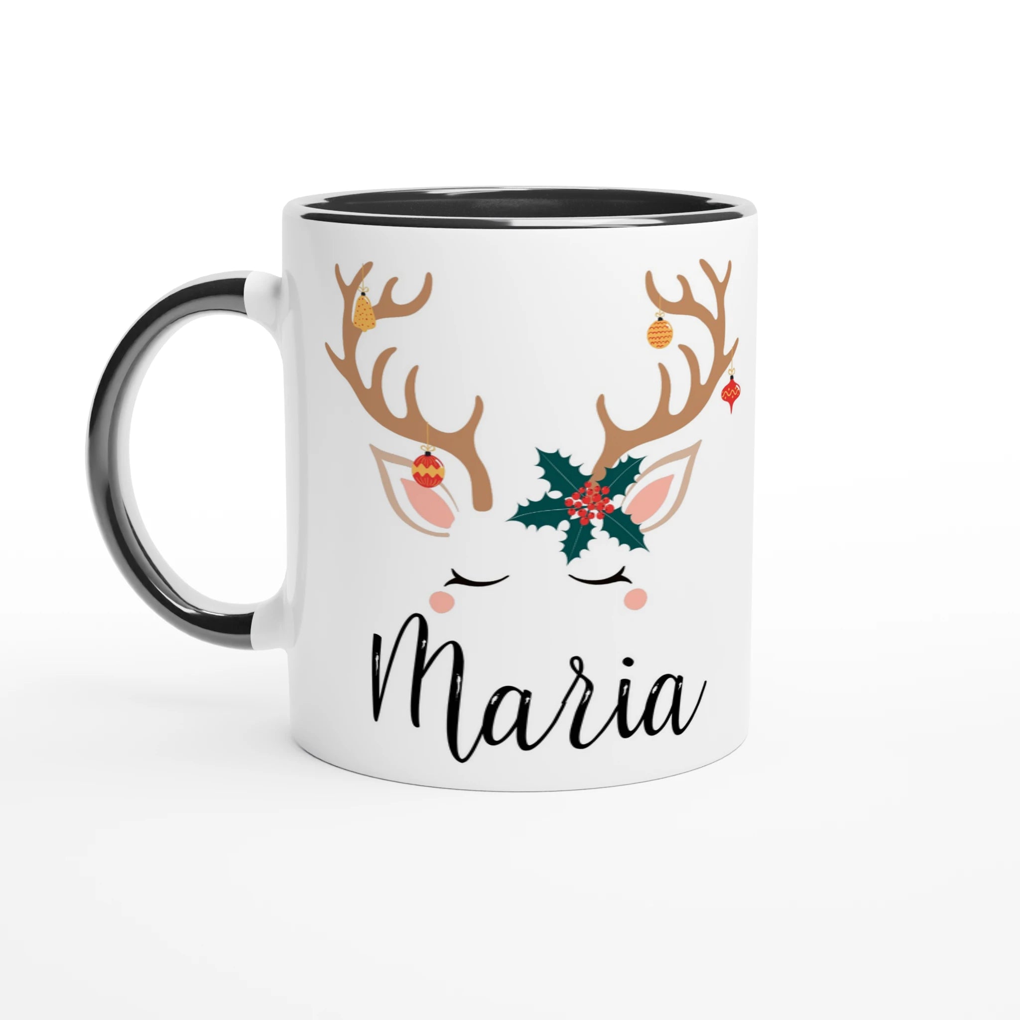 Mug de Noël avec visage de renne, bois décorés de boules festives et feuille de houx, anse noire et intérieur noir.