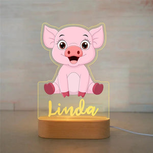 Veilleuse cochon personnalisée avec prénom, éclairage LED sécurisé, parfaite pour une décoration chambre bébé et un cadeau de naissance unique.