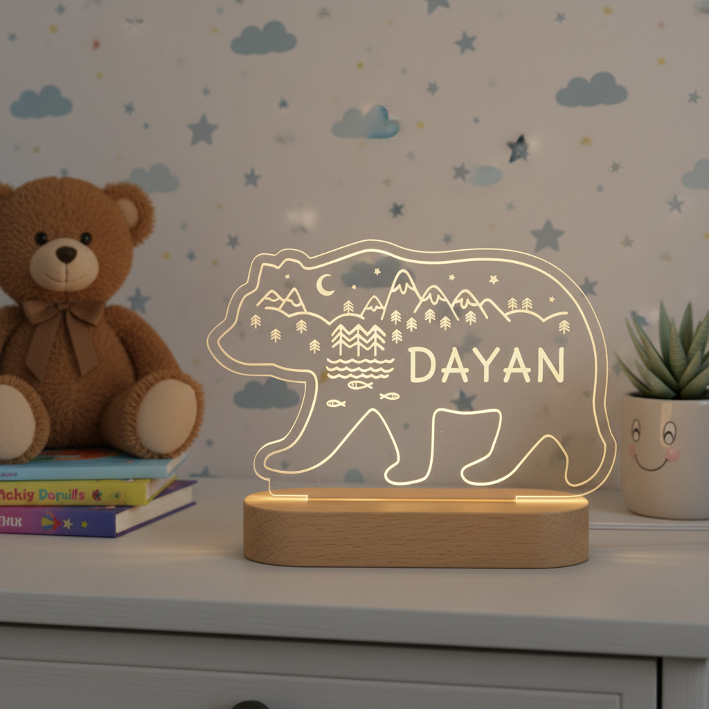 veilleuse ours en acrylique et base bois éclairée sur un meuble pour enfant