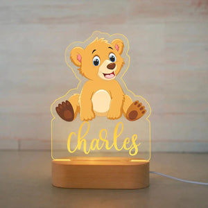 Veilleuse ours personnalisée avec prénom, éclairage LED doux et sécurisant, idéale pour une décoration chambre bébé et un cadeau de naissance unique.