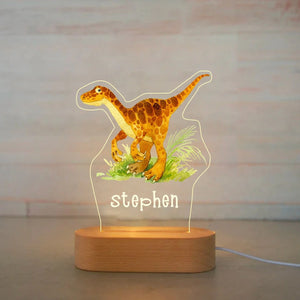 Veilleuse dinosaure personnalisée avec prénom – Lampe LED en bois, design vélociraptor, parfaite pour une chambre de bébé et un cadeau personnalisé.