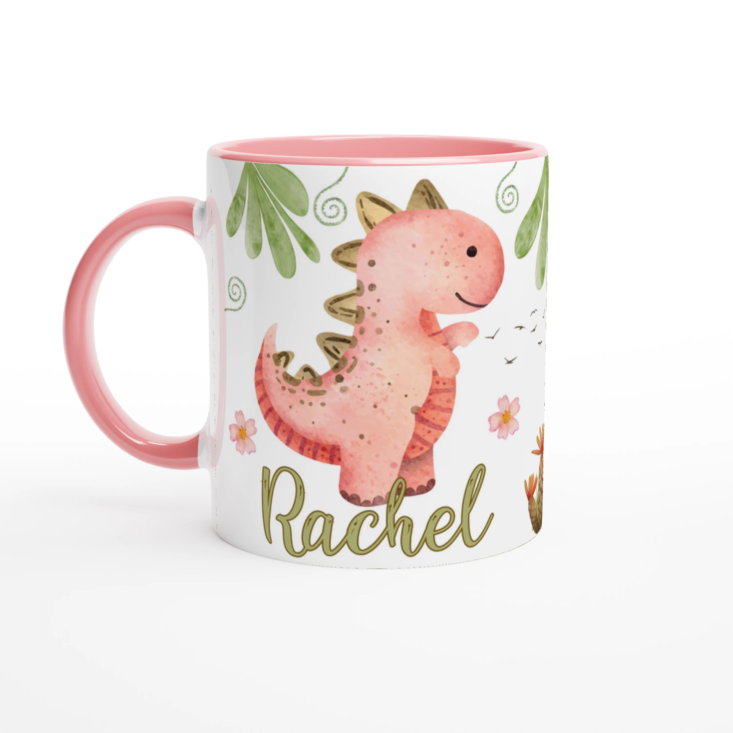 Mug personnalisé pour enfant avec motif dinosaure et prénom, intérieur rose, parfait pour un cadeau adorable.

