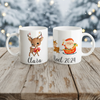 Mug enfant personnalisé sur le thème de Noël avec illustration de renne et père Noël sur fond hivernal