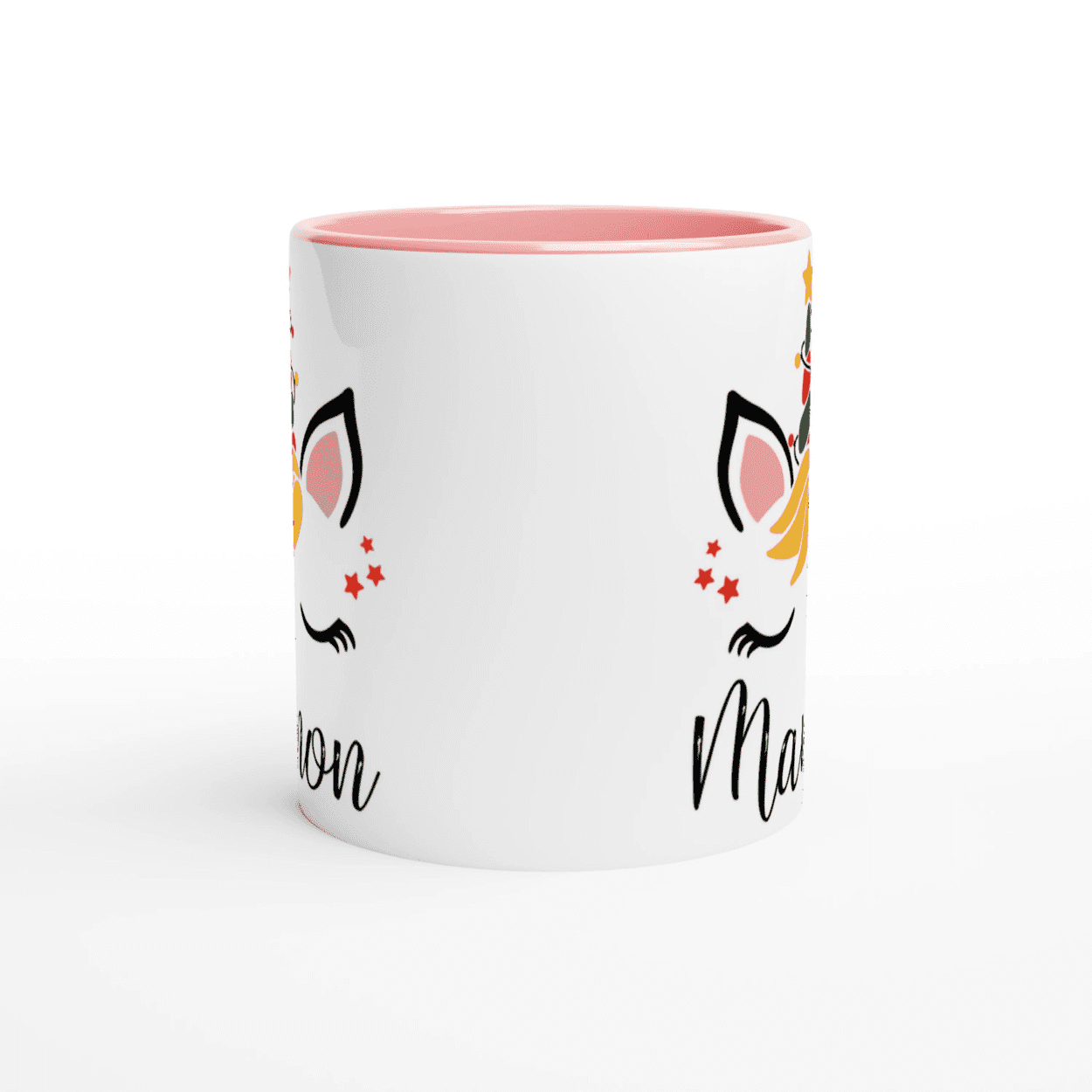 Mug blanc avec illustration licorne de Noël, étoiles décoratives, anse rose et intérieur rose