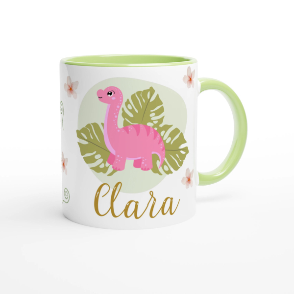 Tasse dinosaure rose personnalisé avec prénom, intérieur vert, parfait comme cadeau pour enfant passionné de dinosaures.

