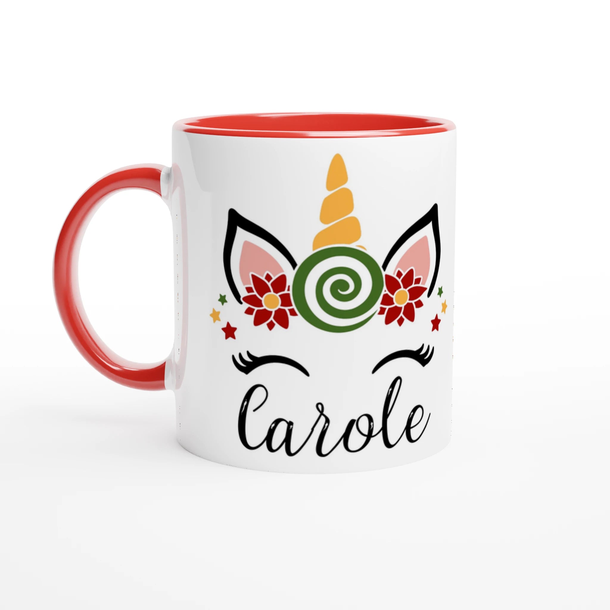 Tasse blanche décorée d’une licorne de Noël avec bonbon spiralé, anse rouge et intérieur rouge.