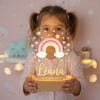 Veilleuse LED enfant arc en ciel personnalisable diffusant une lumière douce et chaleureuse